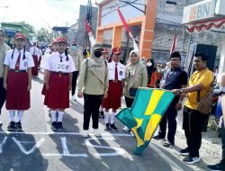 SD se-Kecamatan Blega Ikuti Gerak Jalan Sambut HUT ke-81 RI, TNI-Polri Imbau Jaga Keselamatan
